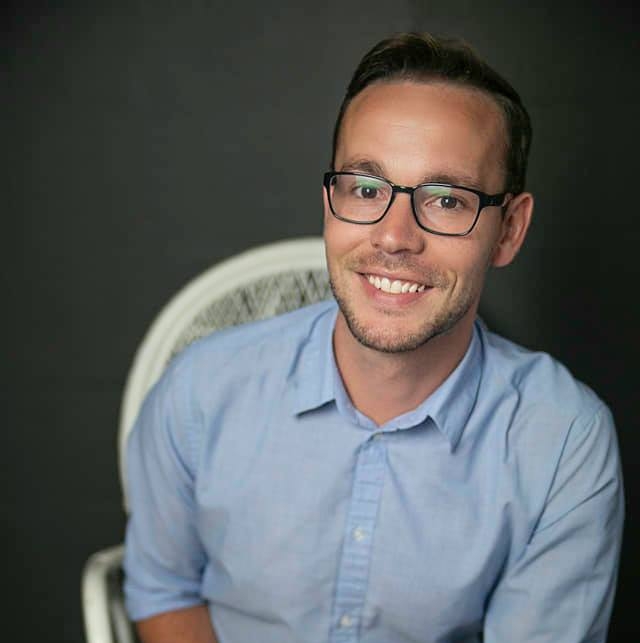 OCTA board member Coltron Rice, wearing glasses and blue button down short-sleeved shirt
